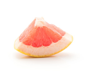 One red grapefruit piece isolated on white background.