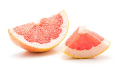 Fototapeta na wymiar One red grapefruit slice and a piece isolated on white background.