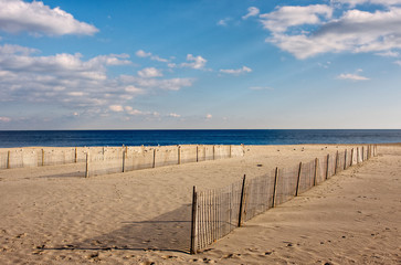 Fototapeta na wymiar Fences on the Beach