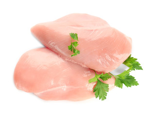 Raw chicken fillet with parsley on white background