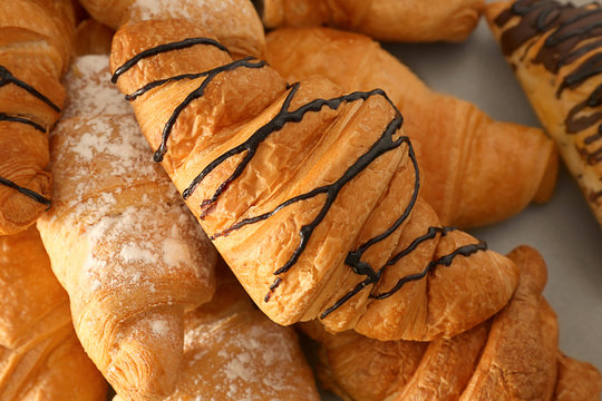Delicious sweet croissants, closeup