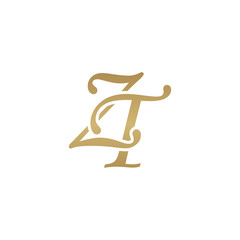 Initial letter ZT, overlapping elegant monogram logo, luxury golden color