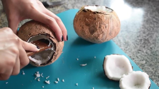 Coconut scraper in hand