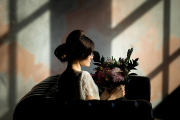 Fototapeta premium Wedding fashion bride with bouquet in hands
