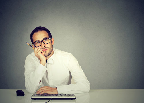 Dreaming?employee Sitting At Table