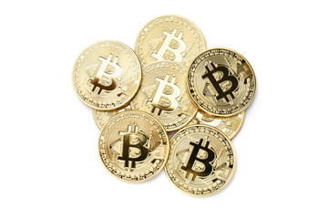 golden bitcoins on white background