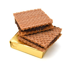Wafers with chocolate on a white background
