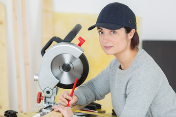 female working at table in workshop