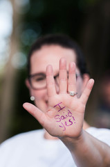 Engagement Announcement Photo with Woman and Diamond Ring
