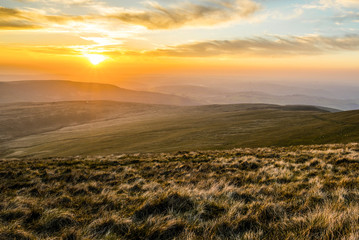 Naklejka premium Sunset over Pen Y Fan, Mountain Range, Wales UK