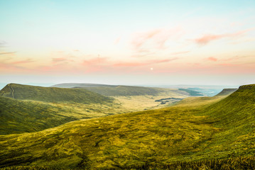 Naklejka na ściany i meble Sunset over Pen Y Fan, Mountain Range, Wales UK