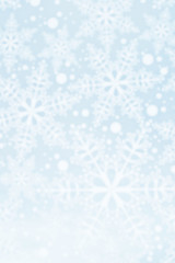 Fototapeta na wymiar Light defocused winter background with blue snowflakes, vertical image