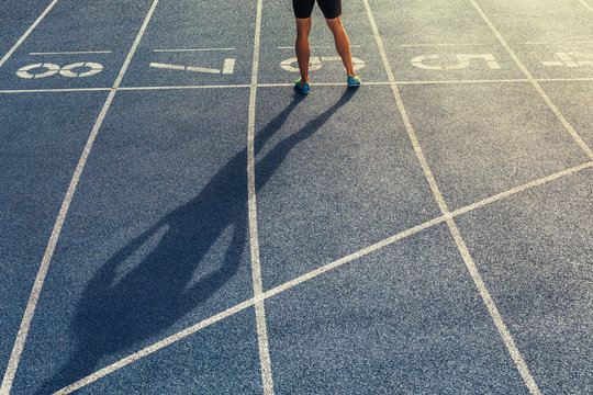 Sprinter standing on running track © Jacob Lund