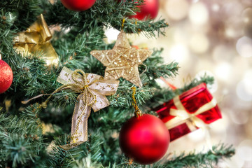 Christmas background - baubles and branch of spruce tree