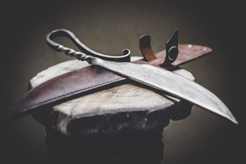 metal knife on the wood