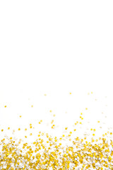 Golden shiny confetti on a white background.
