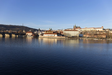 View on the winter Prague gothic Castle above River Vltava, Czech Republic