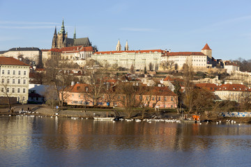 Obraz premium View on the winter Prague gothic Castle above River Vltava, Czech Republic