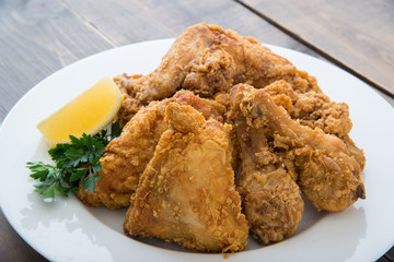 fried chicken with lemon and parsley