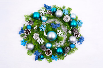Christmas wreath with pale blue and turquoise baubles, silver beads