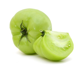 Green Tomato and slice on white