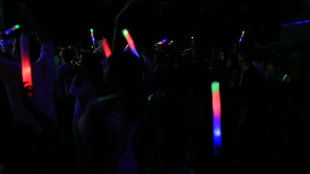 shining party, glow party, People at a party with Glow sticks, glow sticks party  people dancing, October 20, 2016 New York USA