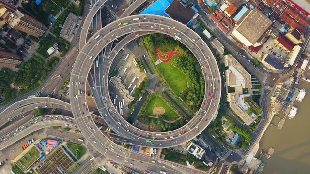 day time shanghai city famous traffic round road junction aerial top view 4k china
