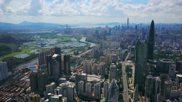 shenzhen cityscape sunny day hong kong border river aerial panorama 4k china
