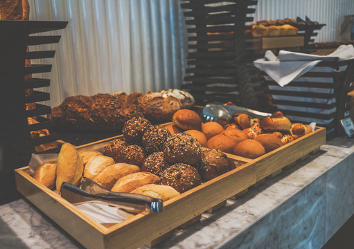 Menu in all-inclusive. Breakfast at the hotel. Croissants and bread. Toning instagram.
