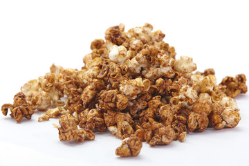 Close - up Caramel chocolate popcorn on white background