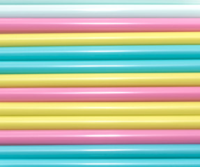 Pastel colored horizontal plastic straws background
