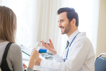 Portrait of Doctor explain medicine showing to patient. People with medical concept.