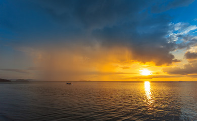 Fototapeta na wymiar Fisherman boat with sunset scene in koh phangan. Horizontal image.