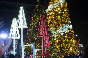 Naklejka na ściany i meble Light decorate beautiful on Christmas Tree Celebration in Bangkok city,Thailand.