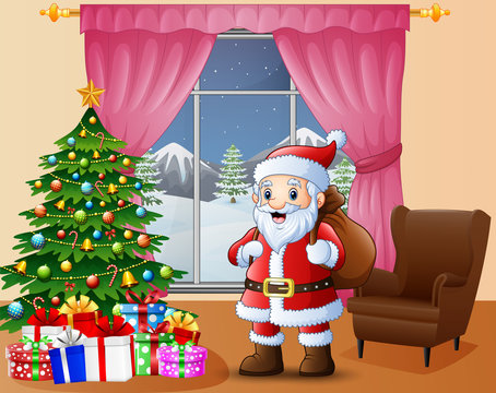 Santa bringing sack in the living room with christmas and new year decoration