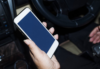 Closeup of hand holding mockup mobile phone