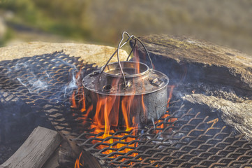 Cooking coffee on a campfire