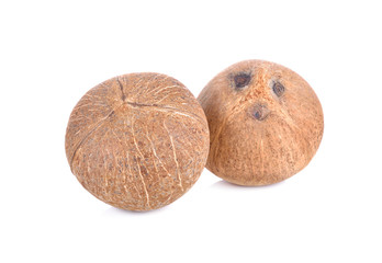 whole mature coconut for oil preparing and coconut milk on white background