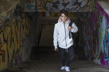 Fototapeta premium young adolescent student in the city