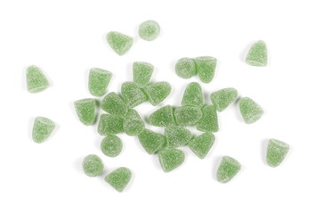 Green jelly, gummy sugar candies isolated on white background, top view