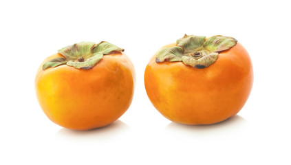 fresh ripe persimmons isolated on white background