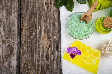 Sea salt, soap and orchid close-up.