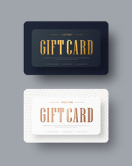 Vector black and white gift card design with gold text and dots on background.