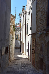 Fototapeta premium Italy, Puglia, Conversano, alleys, houses and streets of the historic center