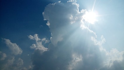 Sun on cloudy sky photo 
