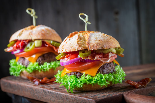 Burger with fresh beef, cheese and vegetables
