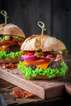 Homemade hamburger with onion, tomato and lettuce