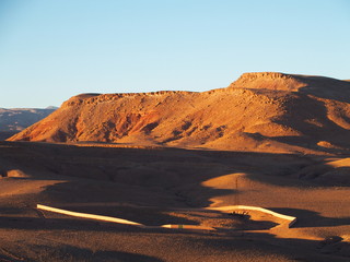 Desert and high ATLAS MOUNTAINS range landscape in central Morocco