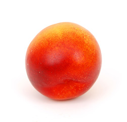 Obraz premium One whole plum isolated on white background