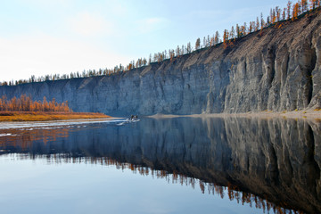 Boat travelers on the  Siberian river